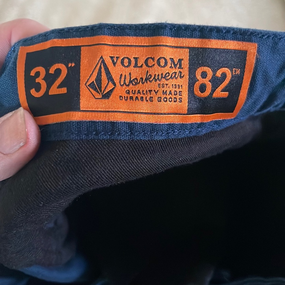 Volcom dark blue cargo work shorts.